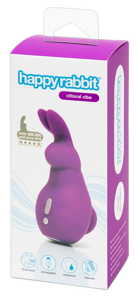 Happy Rabbit Clitoral Vibe in Lila – Klitorisvibrator mit flexiblen Bunny-Ohren zusammen mit der Happy Rabbit Produktverpackung – erhältlich bei Evoria Care