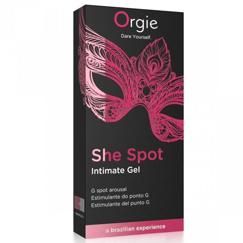 ORGIE She Spot – schwarz-pinkfarbene Originalverpackung des G-Punkt-Stimulationsgels mit großem She Spot Schriftzug, dekorativem pinkfarbenem Blumenmotiv und ORGIE Markenlogo in aufrechter Vorderansicht auf weißem Hintergrund – erhältlich bei Evoria Care