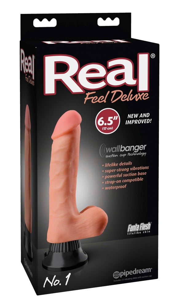 Real Feel Deluxe No. 1 – realistischer Vibrator mit Saugfuß zusammen mit der Real Feel Produktverpackung – erhältlich bei Evoria Care