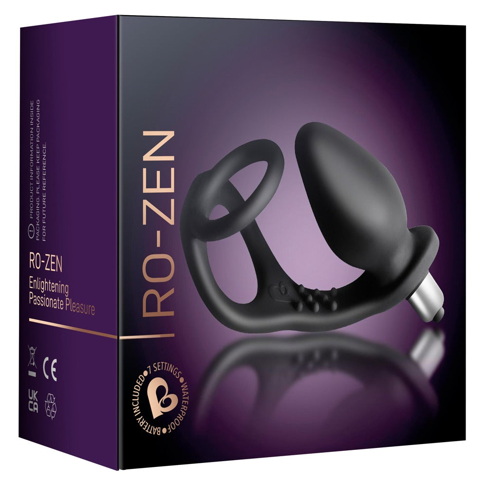 Rocks Off RO-ZEN in Schwarz – Penis- und Hodenring mit Vibro-Analplug zusammen mit der Rocks Off Produktverpackung – erhältlich bei Evoria Care