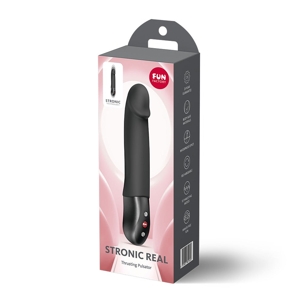 FUN FACTORY STRONIC REAL Premium-Pulsator in Schwarz neben der Originalverpackung