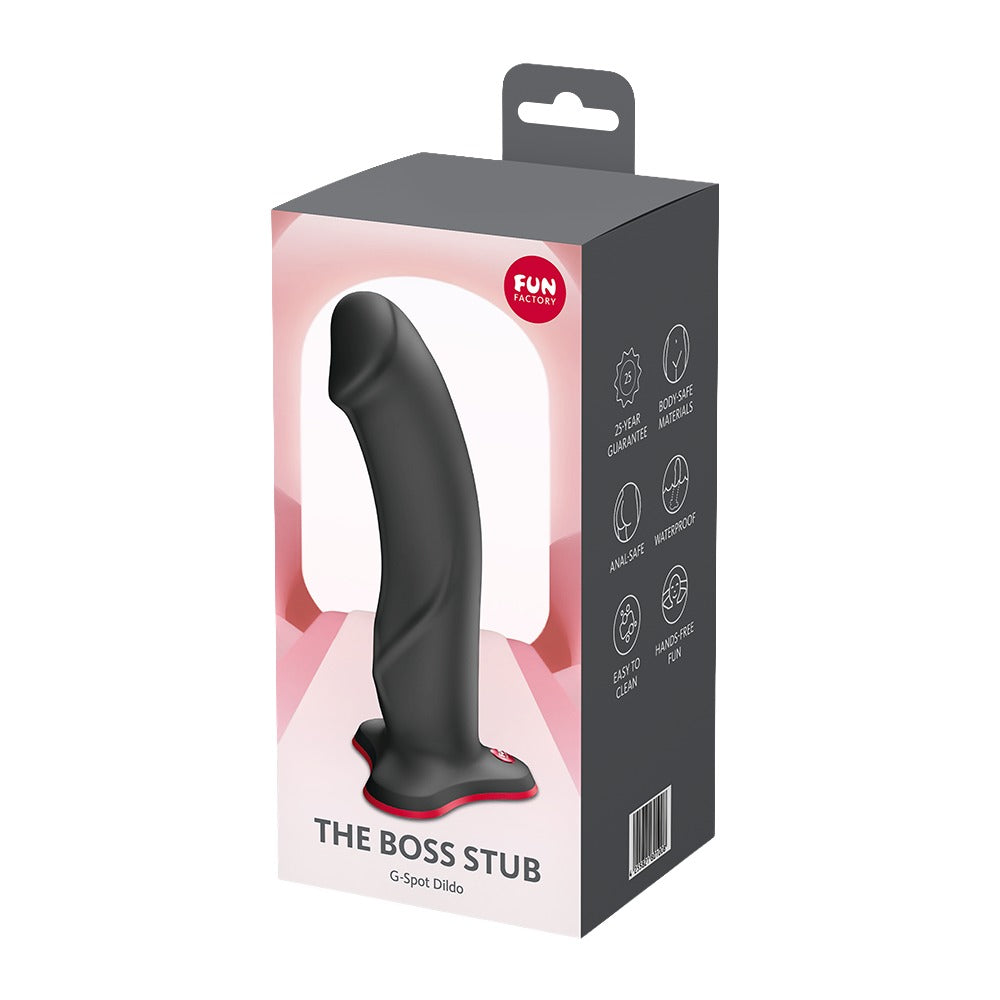 FUN FACTORY THE BOSS STUB realistischer Dildo in Schwarz mit Saugfuß neben der Originalverpackung