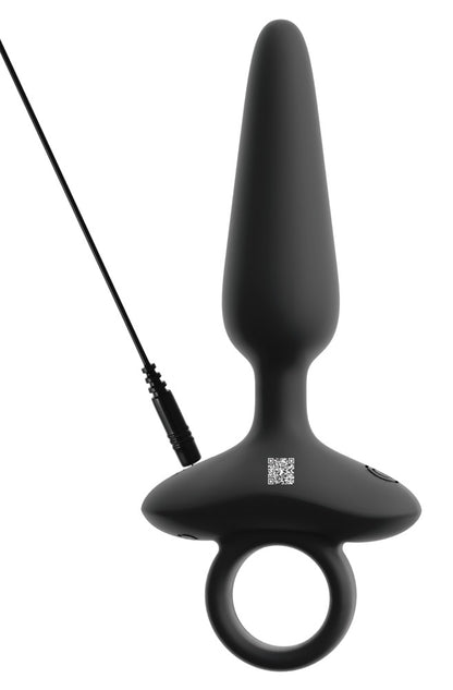 ANOS flexibler Analplug in Schwarz – aufrechte Produktansicht mit breiter Basis, Ringgriff und angeschlossenem Ladekabel