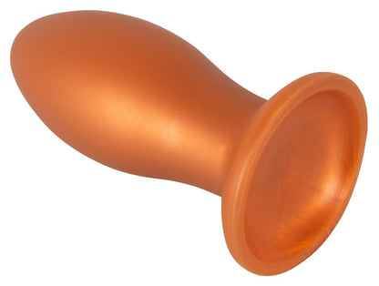 ANOS XL Analplug aus Liquid Silicone in Orange – liegende Produktansicht mit voluminösem Schaft und rundem Saugfuß