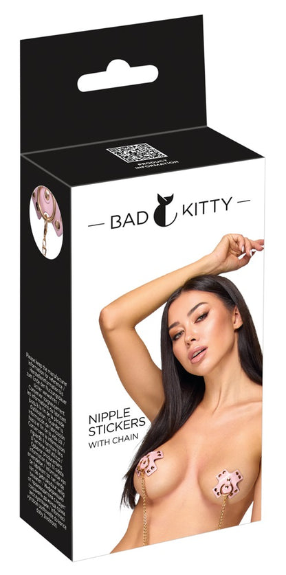 Bad Kitty Nipple Stickers with Chain in Rosé und Gold – Produktverpackung mit Abbildung der Kreuz-Cover
