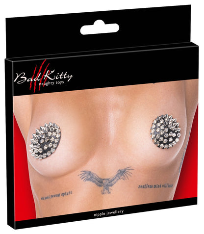 Produktverpackung der runden Bad Kitty Nippelsticker mit Spike-Nieten
