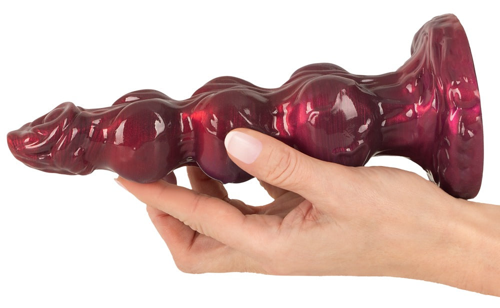 Beasty Cocks Werewolf Willie in der Hand zur Darstellung der flexiblen und biegsamen Konstruktion