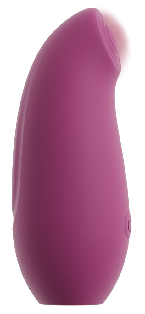 beau coeur OMINO Thumping Stimulator in Pink in Unteransicht mit kompakter abgerundeter Gehäuseform