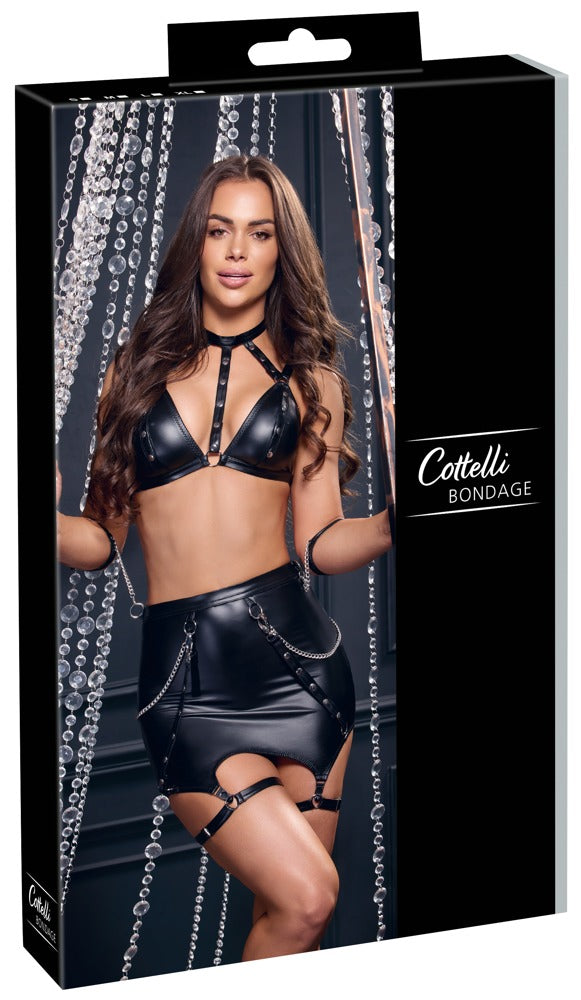 Verpackung des Cottelli BONDAGE Straps-Sets mit Riemen-BH, Minirock und Soft-Handfesseln