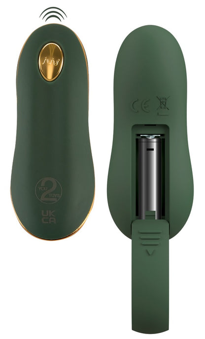 Emerald Love Fernbedienung in Detailansicht mit grünem Gehäuse, goldfarbenem Bedienelement und kompakter Form