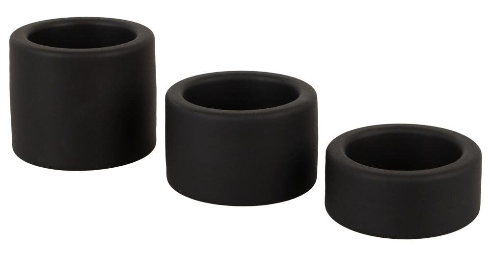 Erecto Ball Stretcher Set aus schwarzem Liquid-Silikon mit drei Hodenringen in unterschiedlichen Breiten