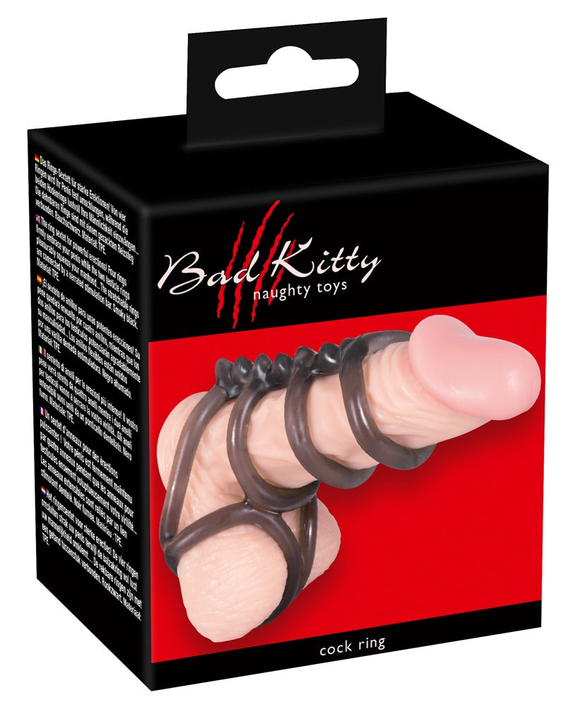 Originalverpackung des Bad Kitty Cockrings mit sechs braunen Penis- und Hodenringen im schwarz-roten Verpackungsdesign – erhältlich bei Evoria Care