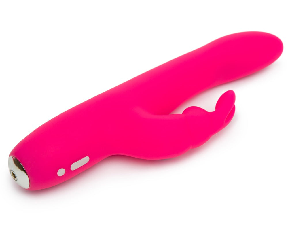 Happy Rabbit Curve Slim in Pink – liegende Seitenansicht mit deutlich geschwungener G-Punkt-Spitze und seitlichem Bunny-Klitorisreizer – erhältlich bei Evoria Care