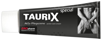 JOYDIVISION TauriX special – schwarze Produktverpackung mit weißem TAURIX Schriftzug und silberfarbenem Motiv in seitlich geneigter Produktansicht auf weißem Hintergrund – erhältlich bei Evoria Care