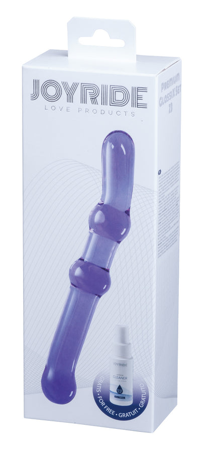 JOYRIDE Premium GlassiX Set 23 – transparente Originalverpackung mit sichtbarem lilafarbenem Glasdildo, strukturiertem Schaft und JOYRIDE Markenbeschriftung – erhältlich bei Evoria Care