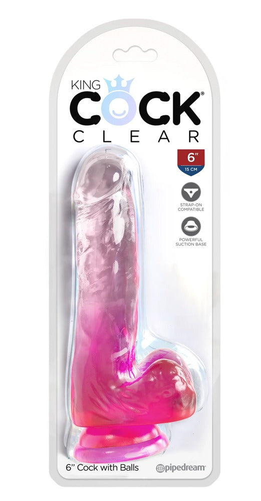 King Cock Clear Cock with Balls realistischer Dildo mit Saugfuß in transparentem Pink, dargestellt in der durchsichtigen Originalverpackung mit King Cock Markenlogo – erhältlich bei Evoria Care