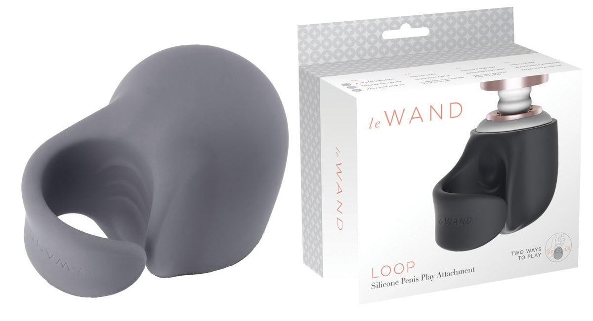 Le Wand Loop grauer Silikonaufsatz für Penis-Stimulation mit ovaler Öffnung, weicher abgerundeter Form und flexibler Silikonstruktur, dargestellt neben der weißen Le Wand Originalverpackung – erhältlich bei Evoria Care