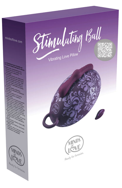 MINDS of LOVE Stimulating Ball Vibratorkissen mit drei Motoren in weiß-violetter Originalverpackung mit Abbildung des lilafarbenen Vibratorkissens und MINDS of LOVE Markenlogo – erhältlich bei Evoria Care