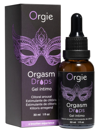 Orgie Orgasm Drops Klitoris-Tropfen in schwarzer Pipettenflasche neben der passenden Originalverpackung mit violettem Design und Orgie Markenlogo – erhältlich bei Evoria Care