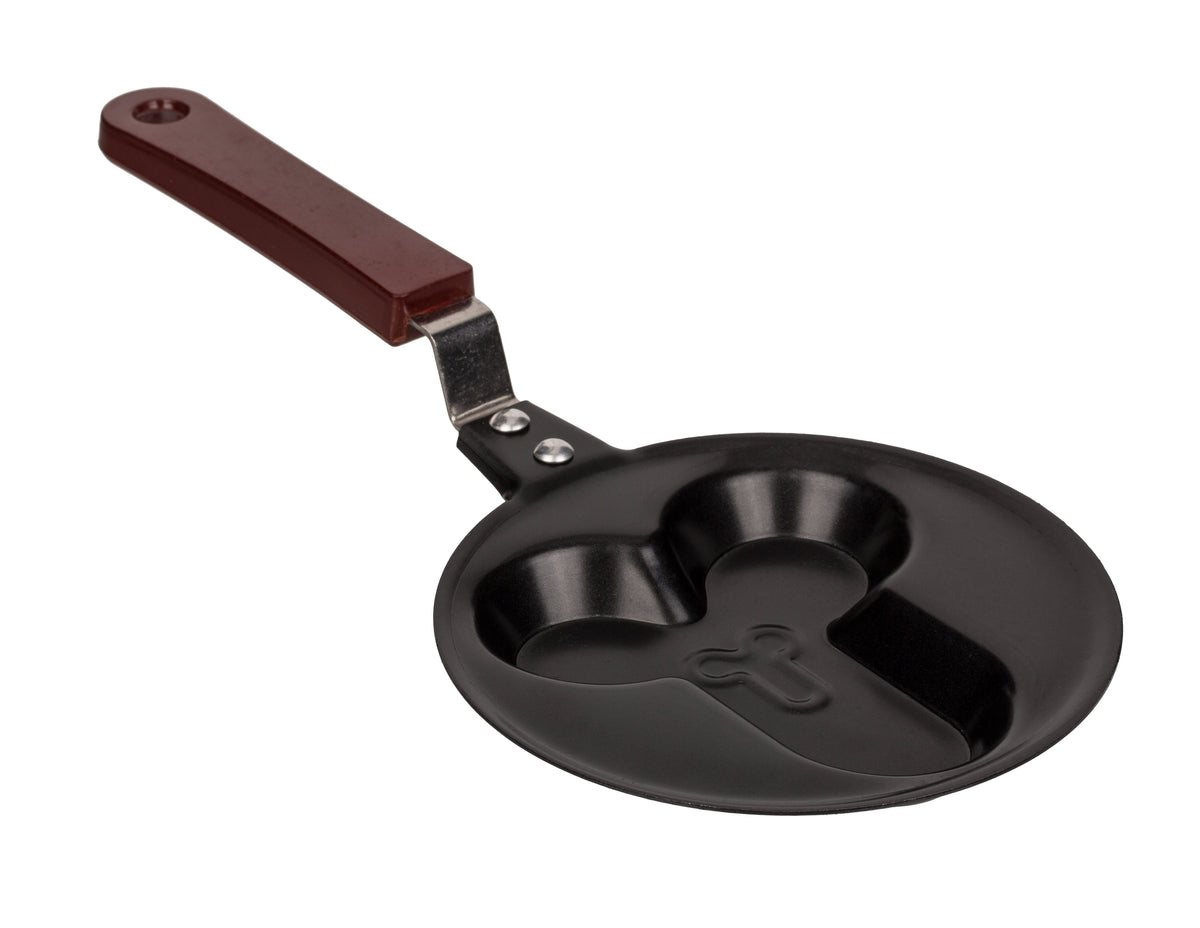 Out of the blue Penis-Bratpfanne – schwarze Mini-Bratpfanne mit ausgeformter Penis-Silhouette im Pfannenboden und braunem Griff in schräger Draufsicht auf weißem Hintergrund – erhältlich bei Evoria Care