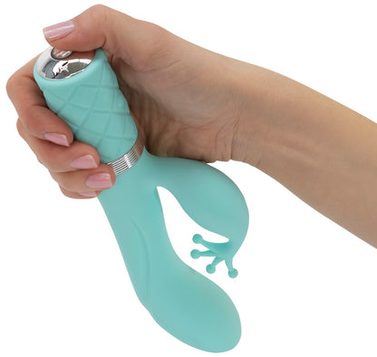 Pillow Talk Kinky Rabbit Vibrator in Mint – Handhabungsansicht mit sichtbarem Hauptschaft, Krönchen-Stimulator und ergonomischem Griff – erhältlich bei Evoria Care