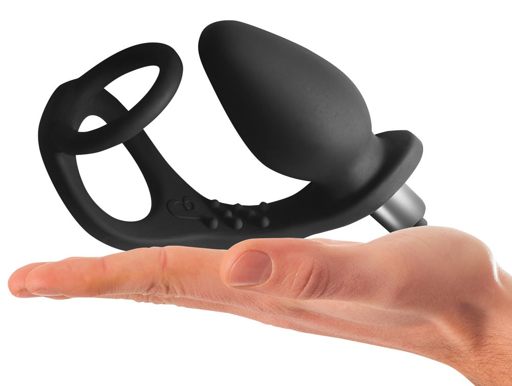 Rocks Off RO-ZEN in Schwarz – Penis- und Hodenring mit Vibro-Analplug in einer Hand zur Darstellung von Größe und Form – erhältlich bei Evoria Care