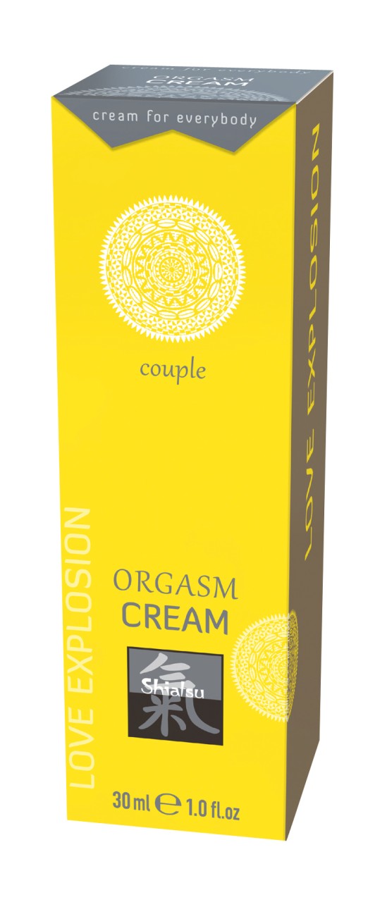 SHIATSU Orgasmus Couple Cream – leuchtend gelbe Originalverpackung der Intimcreme für Paare mit weißem kreisförmigem Grafikmotiv, schwarzem unteren Etikett und grauer Verpackungsoberseite in schräger Produktansicht auf weißem Hintergrund – erhältlich bei Evoria Care