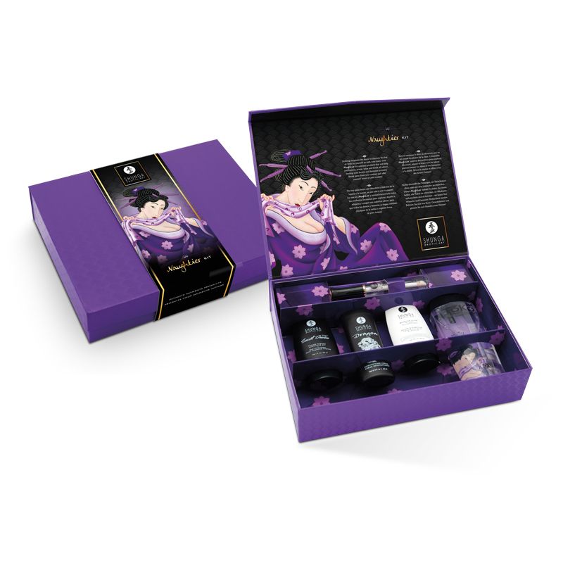 SHUNGA Naughtier Kit – violette Geschenkbox mit geöffnetem Deckel und schwarzem Inneneinsatz, in dem mehrere Pflegeprodukte angeordnet sind – erhältlich bei Evoria Care