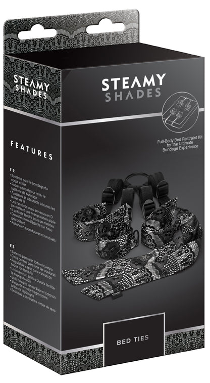 STEAMY SHADES Bed Ties verstellbares Unterbett-Fesselsystem in schwarzer Originalverpackung mit Abbildung der Fesselmanschetten, Gurte und Verbindungselemente sowie STEAMY SHADES Markenlogo – erhältlich bei Evoria Care