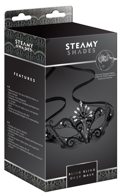 STEAMY SHADES Bling Bling Orgi Mask Augenmaske in schwarzer Originalverpackung mit Abbildung der schwarz-silberfarbenen Schmuckmaske und STEAMY SHADES Markenlogo in frontaler Ansicht – erhältlich bei Evoria Care