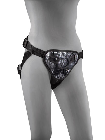 STEAMY SHADES Classic Harness schwarzer verstellbarer Strap-on Harness mit gemusterter Frontpartie, zentralem Befestigungsring und verstellbaren Gurten, an einer grauen Schaufensterpuppe in frontaler Trageansicht – erhältlich bei Evoria Care