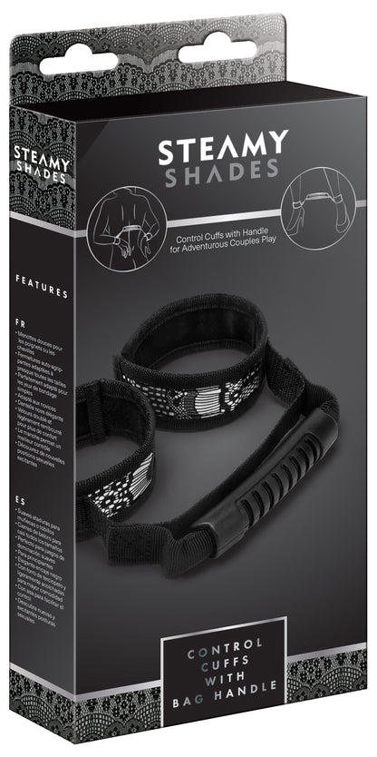 STEAMY SHADES Control Cuffs gepolsterte Hand- und Fußfesseln mit Kontrollgriff in schwarzer Originalverpackung mit Abbildung der verstellbaren Fesselmanschetten und STEAMY SHADES Markenlogo – erhältlich bei Evoria Care