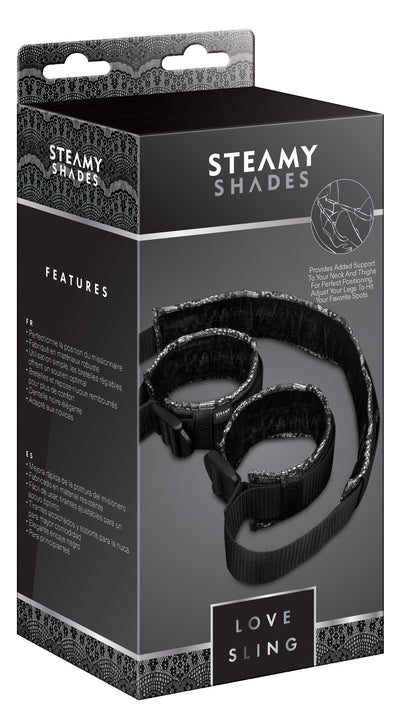 STEAMY SHADES Love Sling verstellbarer Positionsgurt in schwarzer Originalverpackung mit Abbildung des schwarzen Gurtsystems und STEAMY SHADES Markenlogo in frontaler Produktansicht – erhältlich bei Evoria Care