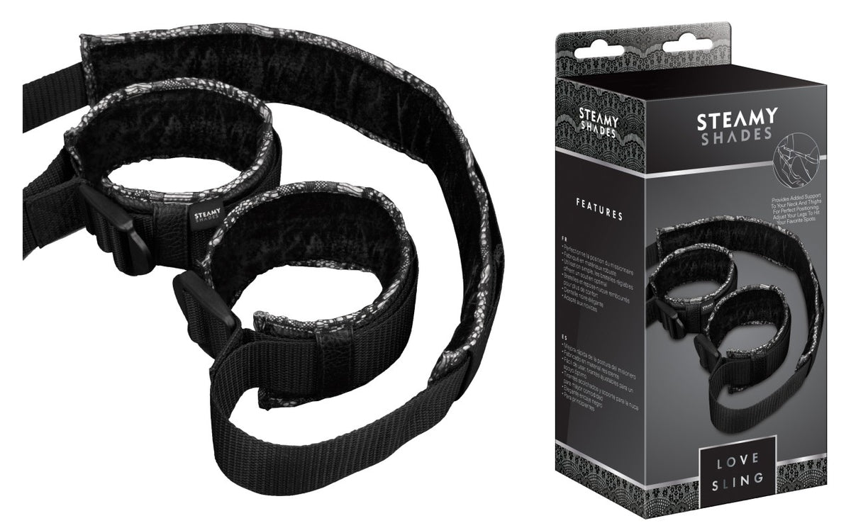 STEAMY SHADES Love Sling verstellbarer Positionsgurt in Schwarz mit breiten textilen Schlaufen, gepolsterten Haltebereichen und verstellbaren Riemen, dargestellt neben der schwarzen Originalverpackung – erhältlich bei Evoria Care