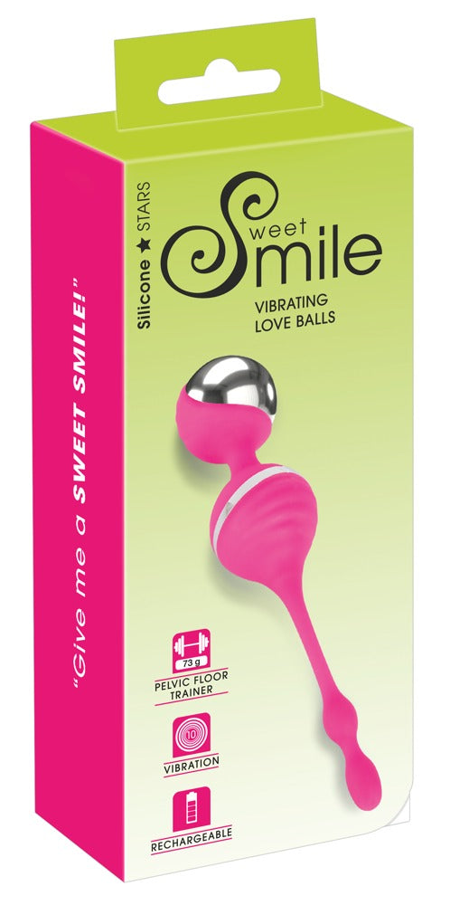 Sweet Smile Vibrating Love Balls in Pink – vibrierende Liebeskugeln zusammen mit der grün-pinken Sweet Smile Verpackung – erhältlich bei Evoria Care