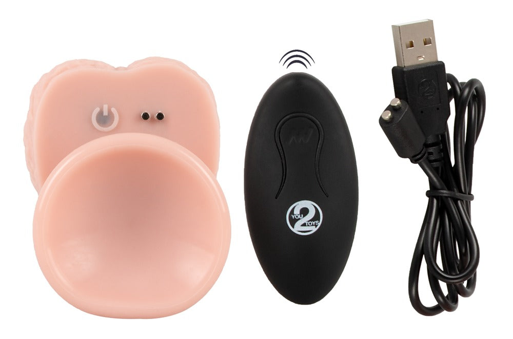 You2Toys Medical Silicone RC Thrusting Vibrator – Detailansicht des Saugfußes mit schwarzer Fernbedienung und Ladezubehör – erhältlich bei Evoria Care