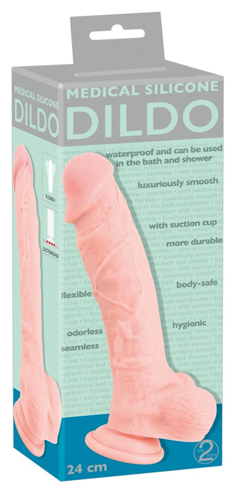 You2Toys Medical Silicone Realistic Dildo in Hautfarbe – realistischer Dildo mit Saugfuß zusammen mit der You2Toys Produktverpackung – erhältlich bei Evoria Care