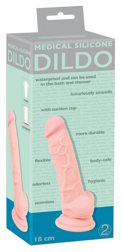 You2Toys Medical Silicone Realistic Dildo in Hautfarbe – realistischer Dildo mit Saugfuß zusammen mit der You2Toys Produktverpackung – erhältlich bei Evoria Care
