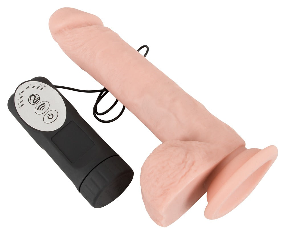 You2Toys Medical Silicone Thrusting Vibrator in Hautfarbe – Handhabungsansicht zur Darstellung der flexiblen Form des Schafts – erhältlich bei Evoria Care
