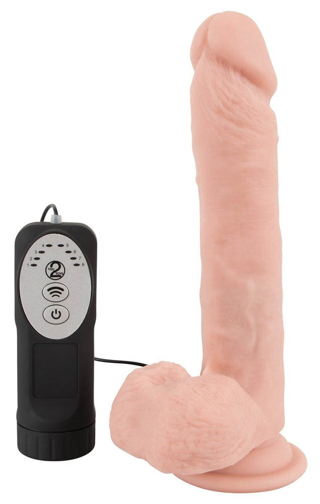 You2Toys Medical Silicone Thrusting Vibrator in Hautfarbe – große Produktansicht des realistisch geformten Vibrators mit Saugfuß und schwarzer Fernbedienung – erhältlich bei Evoria Care
