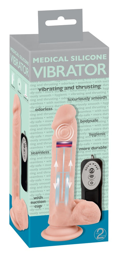 You2Toys Medical Silicone Thrusting Vibrator – realistisch geformter Vibrator mit Saugfuß zusammen mit der You2Toys Produktverpackung – erhältlich bei Evoria Care