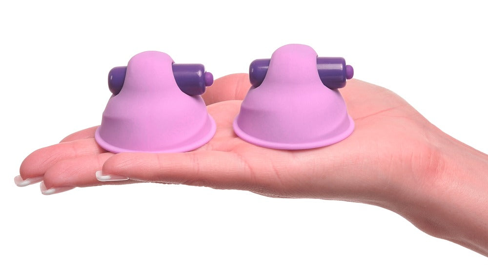 Fantasy For Her Vibrating Nipple Suck-Hers liegend mit zwei lilafarbenen Saugglocken und kleinen integrierten Vibratoren