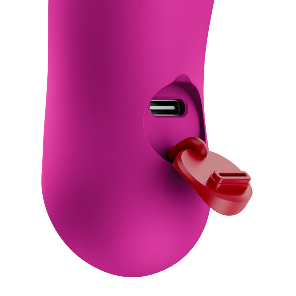 FUN FACTORY BIJOU Mini-Vibrator in Pink mit Detailansicht des Ladeanschlusses