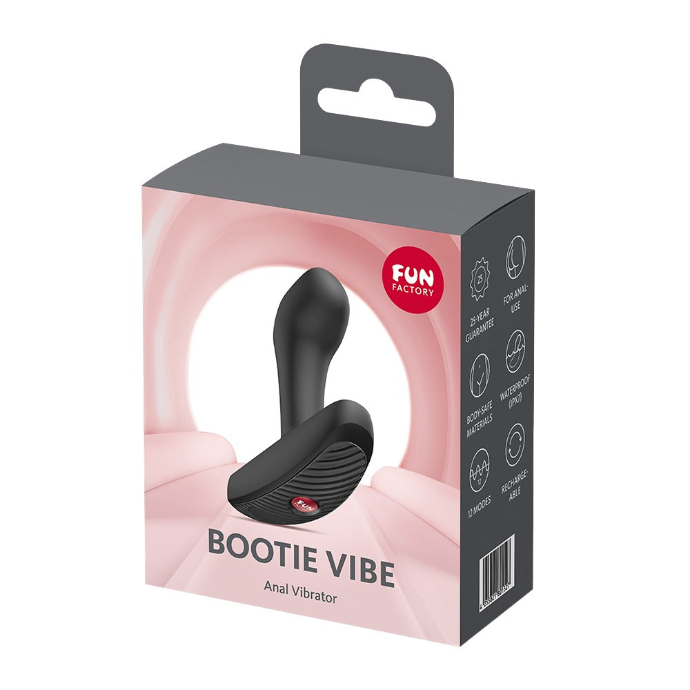 FUN FACTORY BOOTIE VIBE Analvibrator in Schwarz neben der Originalverpackung