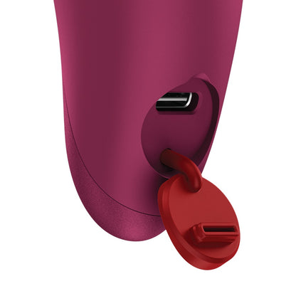 FUN FACTORY CHARME Klitorisvibrator in Pink mit Detailansicht des Ladeanschlusses