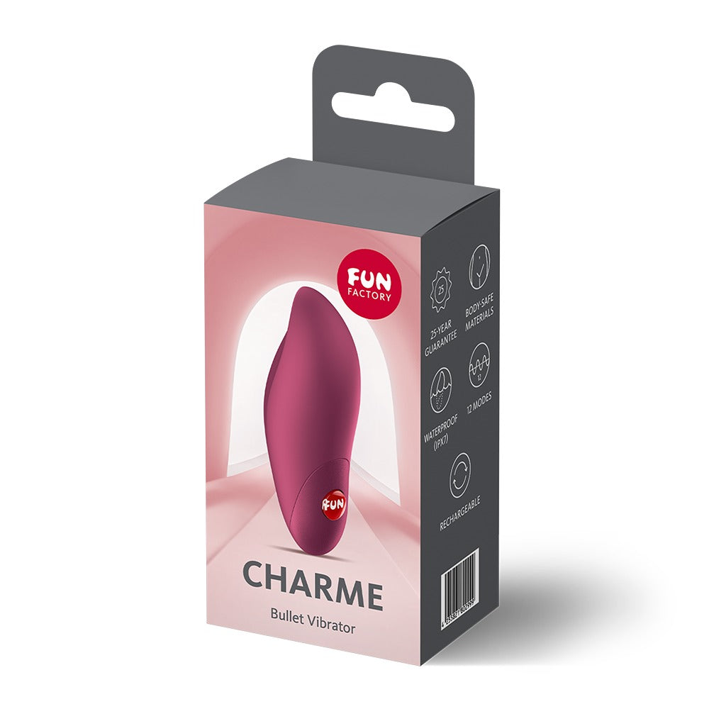 FUN FACTORY CHARME Klitorisvibrator in Pink neben der Originalverpackung