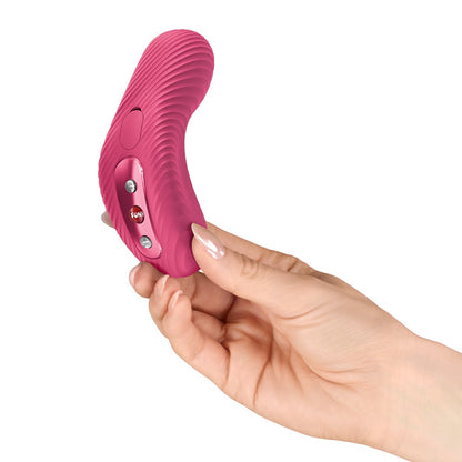 FUN FACTORY LAYA III Auflegevibrator in Pink in einer Hand zur Veranschaulichung der Produktgröße