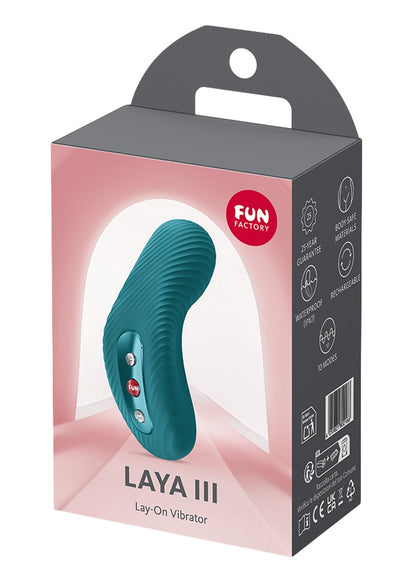 FUN FACTORY LAYA III Auflegevibrator in Türkis neben der Originalverpackung