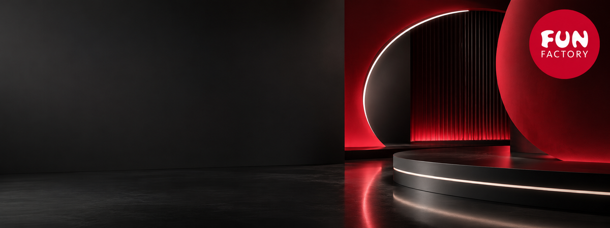 Fun Factory Markenwelt mit roter Lichtarchitektur, schwarzen Flächen und moderner hochwertiger Premium-Atmosphäre