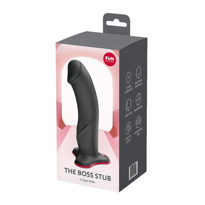 FUN FACTORY THE BOSS STUB realistischer Dildo in Schwarz mit Saugfuß neben der Originalverpackung